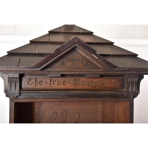 200 - An early 20th century circa 1902 American 'Tabard Inn Library' ebonised oak revolving bookcase. The ... 