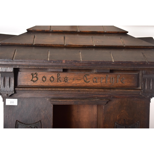 200 - An early 20th century circa 1902 American 'Tabard Inn Library' ebonised oak revolving bookcase. The ... 