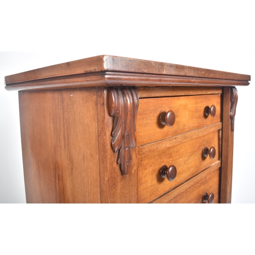 202 - A Victorian 19th century mahogany upright Wellington chest of drawers. Raised on a plinth base with ... 