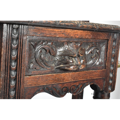 204 - A Victorian 19th century carved oak 'Green Man' hall stand. The stand having a fret work gallery top... 