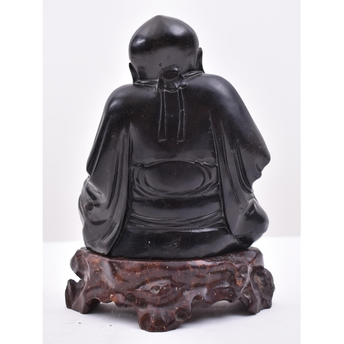 21 - A 20th century soapstone hand carved censer in form of deity of Longevity (Shao Lao). The figure sea... 