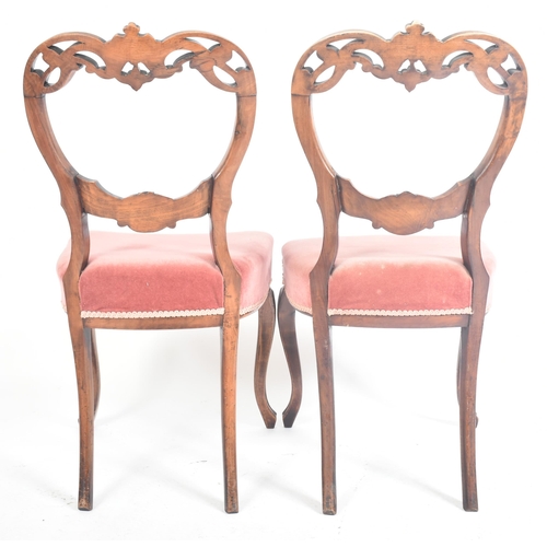 214 - A set of four late 19th century French continental carved oak spoon back dining chairs. Each chair h... 