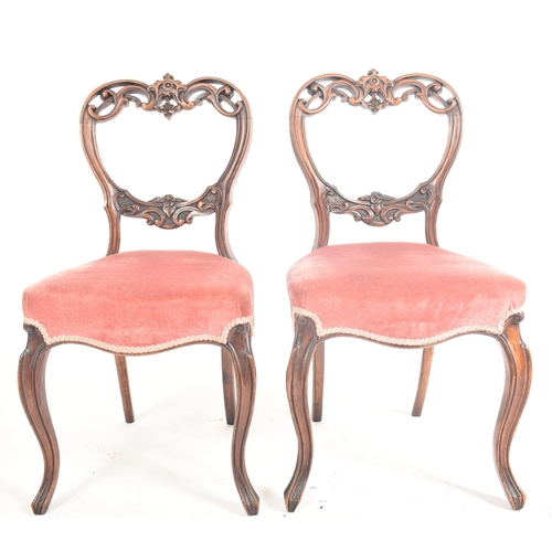 214 - A set of four late 19th century French continental carved oak spoon back dining chairs. Each chair h... 