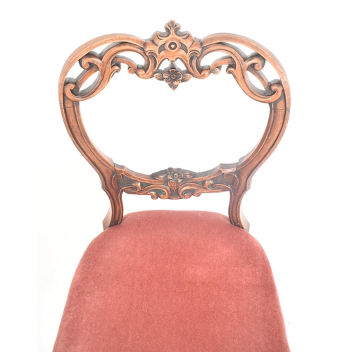 214 - A set of four late 19th century French continental carved oak spoon back dining chairs. Each chair h... 