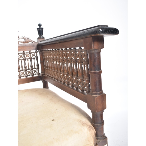 218 - A late 19th century circa 1890s Syrian Islamic carved oak hall bench / settee. The bench having intr... 