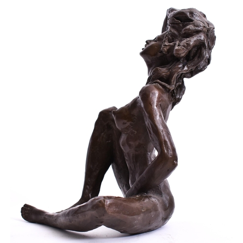 223 - After Auguste Moreau - an early 20th century French bronze sculpture of a nude woman. The woman hold... 