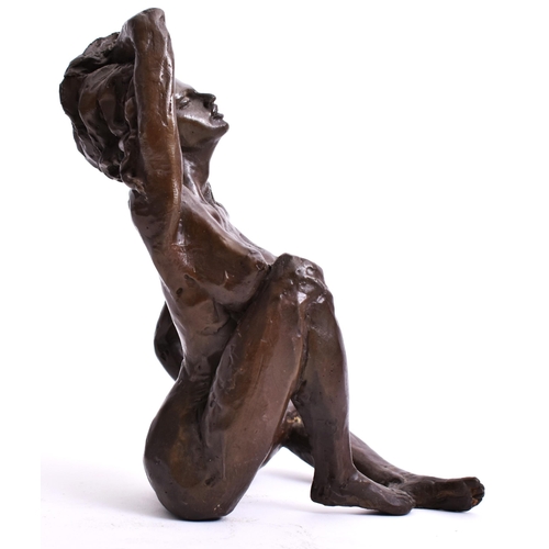 223 - After Auguste Moreau - an early 20th century French bronze sculpture of a nude woman. The woman hold... 