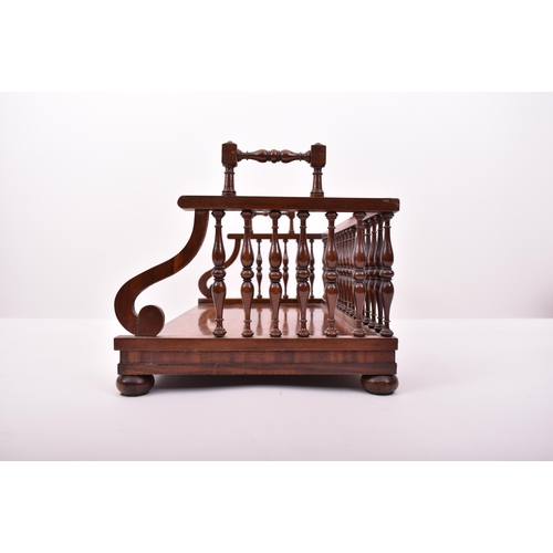 233 - A Victorian 19th century mahogany spindle gallery book tray / trough. Spindle gallery sides with twi... 