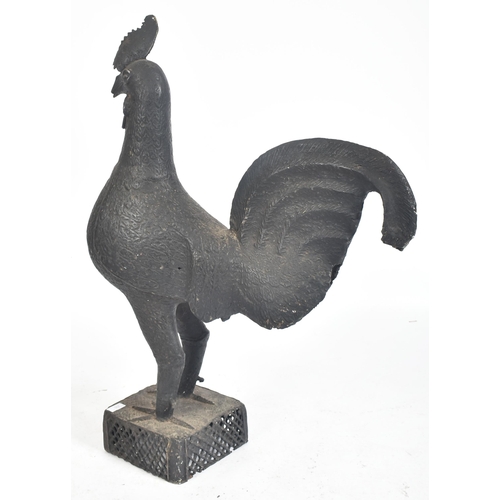 235 - A large cast metal rooster - cockerel  of Dahomey, Benin origin. Cast metal and ebonised being raise... 