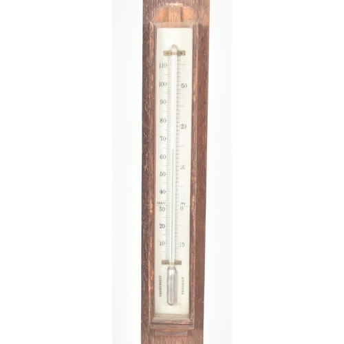 242 - A George III 18th century M. Pillischer of London stick wall barometer. The barometer in oak case wi... 