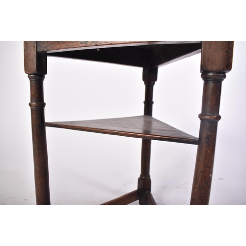 243 - A part 17th century oak clover table. The 17th century oak base of turned leg form with peripheral s... 