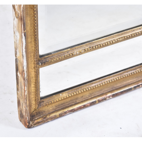 249 - A 19th century Regency gilt wood and gesso worked triptych overmantel mirror. The mirror with indivi... 