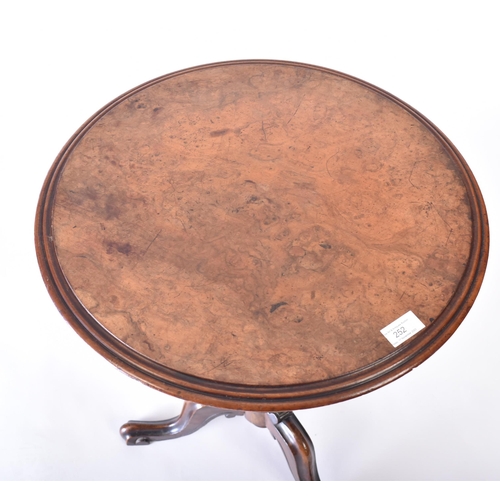 252 - A 19th century Victorian burr walnut tripod occasional table. The table having a circular top with b... 