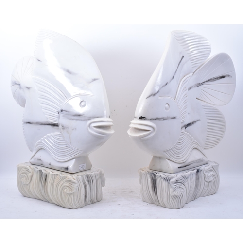 260 - A pair of large vintage 20th century Art Deco inspired resin fish sculptures on stands Each fish in ... 