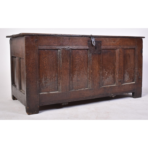 261 - A George III 18th century oak coffer blanket box. The chest having a hinged top with studded joints ... 