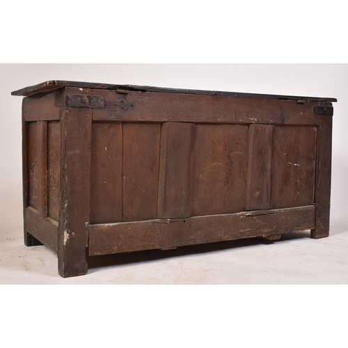 261 - A George III 18th century oak coffer blanket box. The chest having a hinged top with studded joints ... 