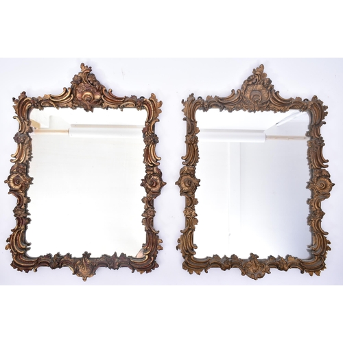 262 - A pair of Italian 19th century Baroque style gilt & gesso painted wall hanging mirrors. Each mirror ... 