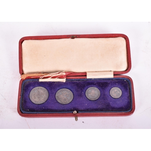 264 - A cased  maundy Money 1918 set. The four piece George V set, with original fitted case of red leathe... 