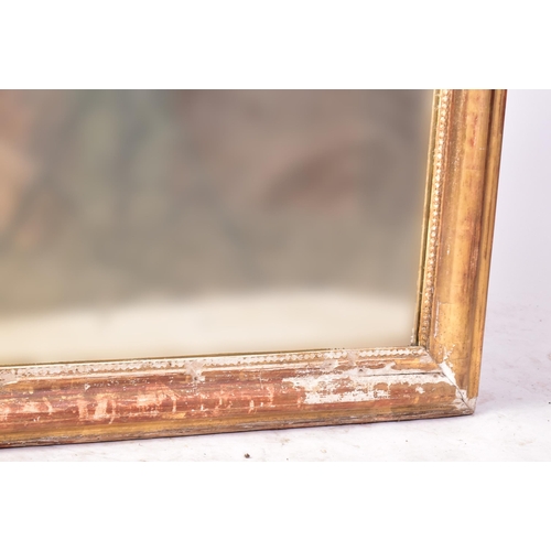 27 - A 19th century Victorian giltwood frame mirror. The mirror having a arched top with cushioned gilt f... 