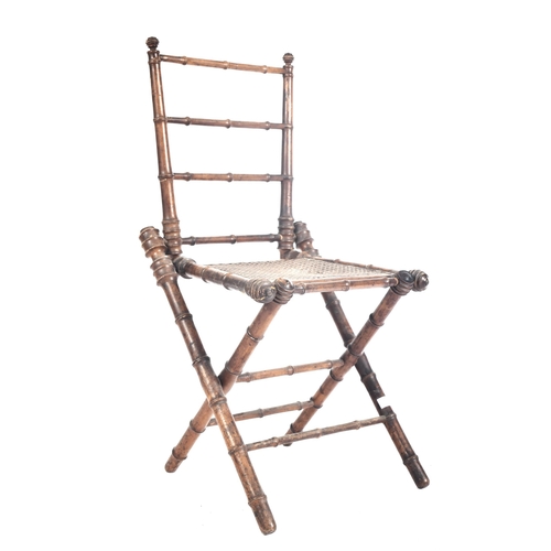 272 - A French inspired early 20th century faux bamboo wooden folding child's chair. The chair having a la... 