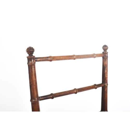 272 - A French inspired early 20th century faux bamboo wooden folding child's chair. The chair having a la... 