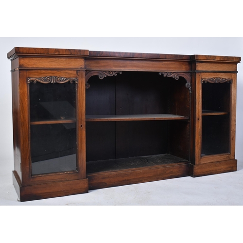 275 - A 19th century mahogany breakfront sideboard credenza. The sideboard having a straight top over a ce... 