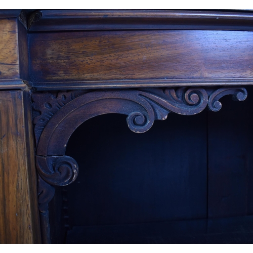 275 - A 19th century mahogany breakfront sideboard credenza. The sideboard having a straight top over a ce... 