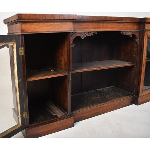 275 - A 19th century mahogany breakfront sideboard credenza. The sideboard having a straight top over a ce... 