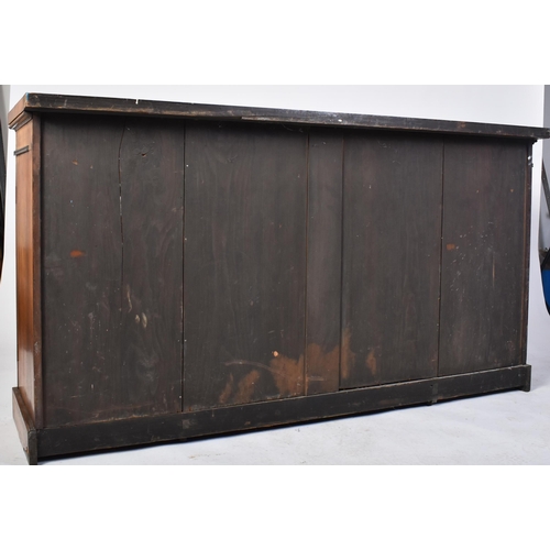 275 - A 19th century mahogany breakfront sideboard credenza. The sideboard having a straight top over a ce... 