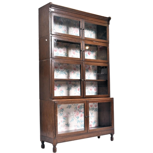 278 - In the manner of Globe Wernicke - An early 20th century circa 1920s oak breakfront stacking library ... 