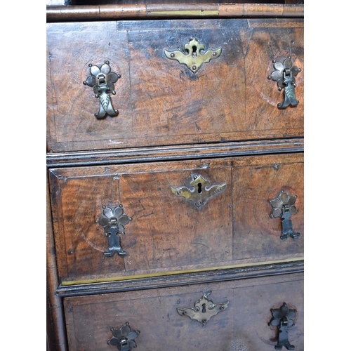 280 - A Queen Anne 18th century walnut chest on stand. The chest having a straight top over a central pige... 