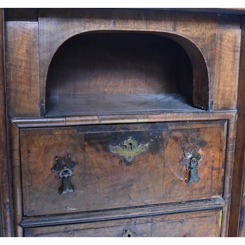 280 - A Queen Anne 18th century walnut chest on stand. The chest having a straight top over a central pige... 