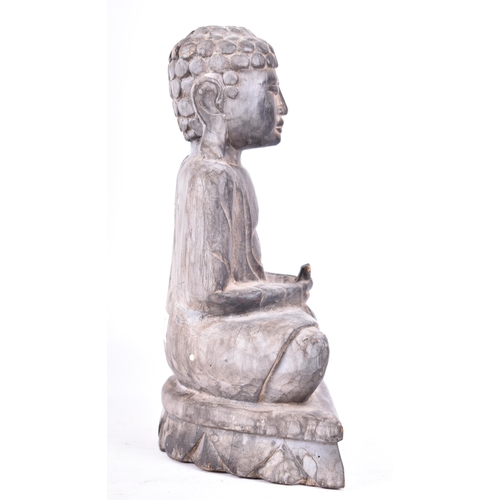 291 - A 20th century Indonesian Oriental hand carved balsa wood meditating Buddha sculpture. The figure wi... 