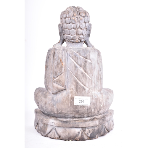 291 - A 20th century Indonesian Oriental hand carved balsa wood meditating Buddha sculpture. The figure wi... 