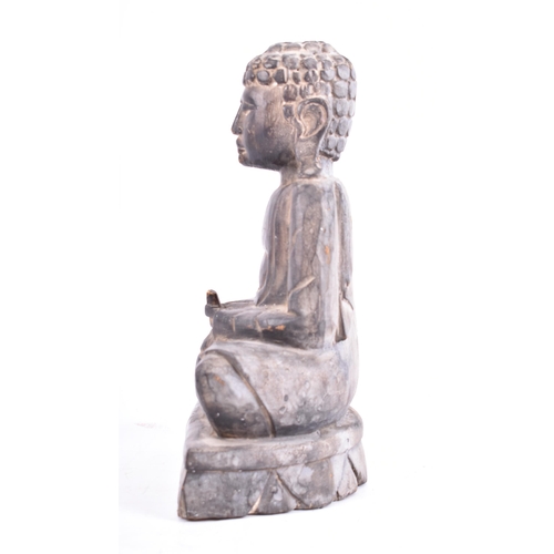 291 - A 20th century Indonesian Oriental hand carved balsa wood meditating Buddha sculpture. The figure wi... 