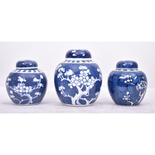 297 - A set of three late 19th century Chinese Oriental blue & white porcelain Prunus patter ginger jars. ... 