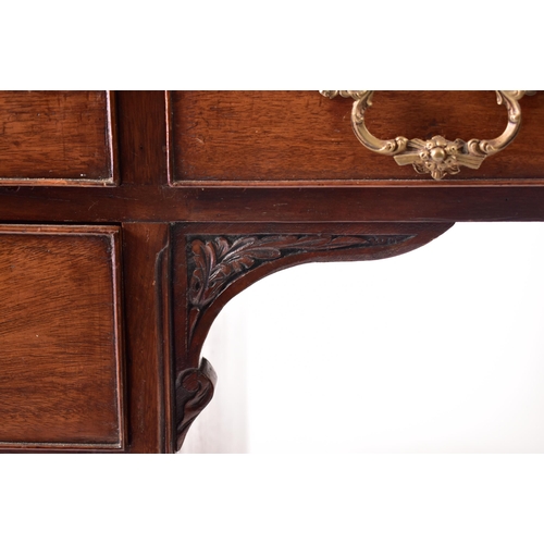 300 - A 19th century Chippendale influenced mahogany office writing table desk. The desk having a pierced ... 