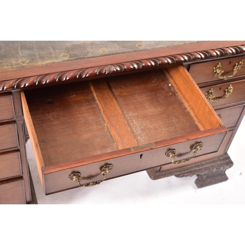 300 - A 19th century Chippendale influenced mahogany office writing table desk. The desk having a pierced ... 