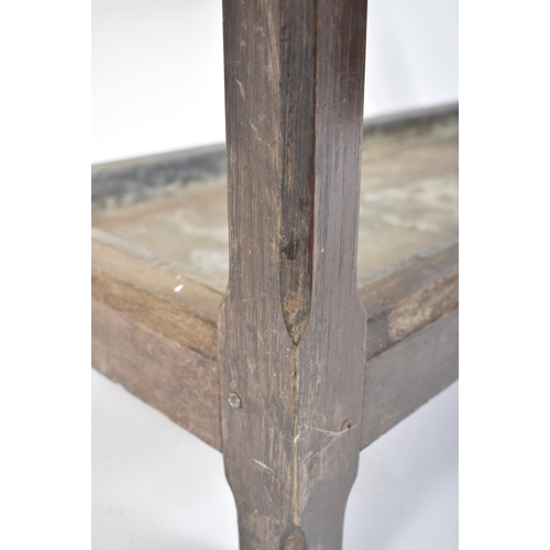 305 - A late Victorian early 20th century circa 1900 oak Arts & Crafts umbrella stick stand. The stand hav... 