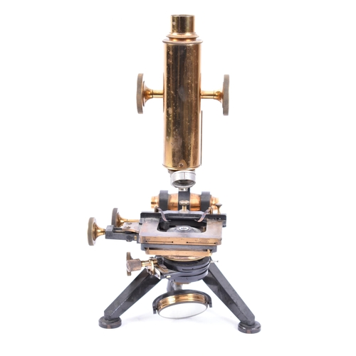 306 - W. Watson & Sons Ltd - An early 20th century brass & metal ' Royal ' microscope. The microscope with... 