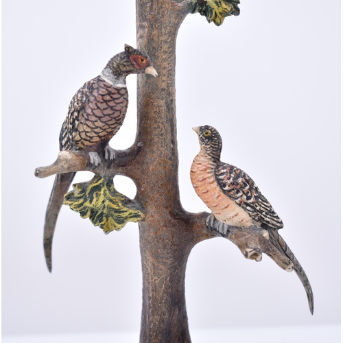 32 - An early 20th century cold painted bronze pheasant lamp base. The lamp having a tree trunk shaped ce... 