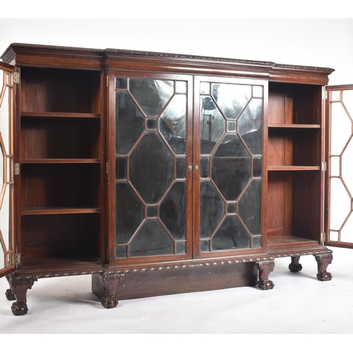 328 - A Victorian 19th century mahogany break front astragal glazed display cabinet. The cabinet having a ... 