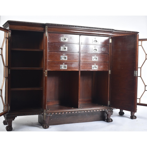 328 - A Victorian 19th century mahogany break front astragal glazed display cabinet. The cabinet having a ... 