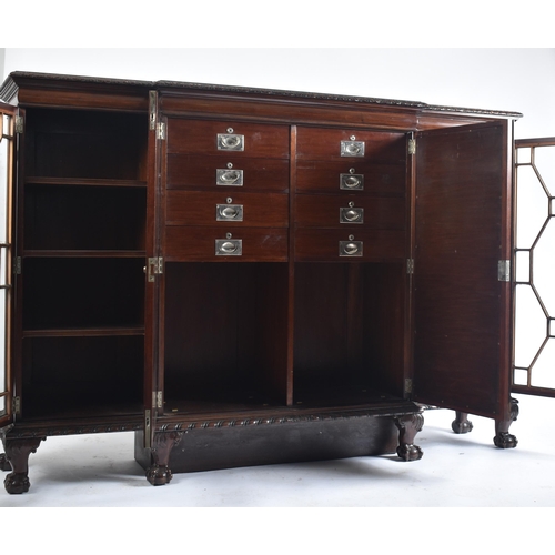 328 - A Victorian 19th century mahogany break front astragal glazed display cabinet. The cabinet having a ... 