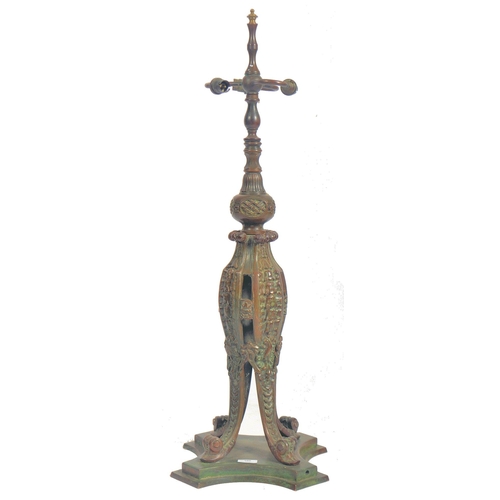 329 - An Italian 19th century Rococo style grand tour bronze floor lamp base. The lamp having a finial ato... 