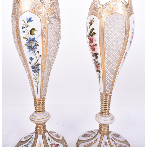 33 - A pair of 19th century Bohemian Czech overlay glass vases. White flash work with chintz foliate disp... 