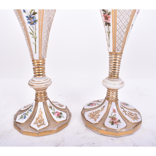 33 - A pair of 19th century Bohemian Czech overlay glass vases. White flash work with chintz foliate disp... 