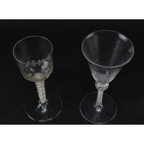 333 - Two 18th century wine glasses, each with a twist stem. One being a mid 18th century circa 1750 glass... 