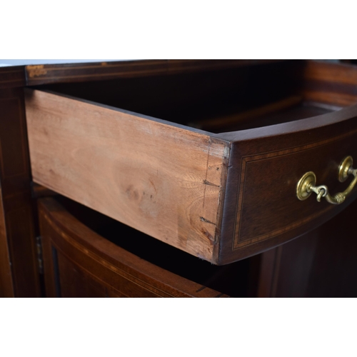 337 - A 19th century Victorian mahogany bow front sideboard / serving board. The server having cross bande... 