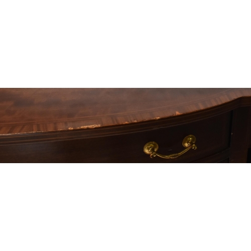 337 - A 19th century Victorian mahogany bow front sideboard / serving board. The server having cross bande... 